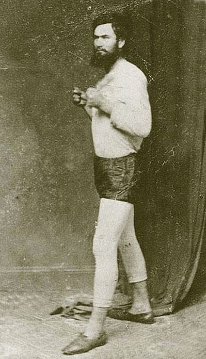 This image has an empty alt attribute; its file name is Ned_Kelly_boxing.jpg